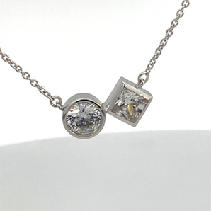 Sterlling Silver Round and Princess Cut Triple A Quality CZ's Necklace
