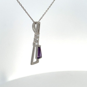 Sterling Silver Elongated Triangle with Clear Round and Purple Color Tapered Cut CZ