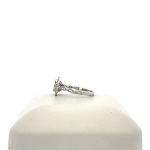 Lady's 14k White Gold Engagement Ring with Oval Cluster Center