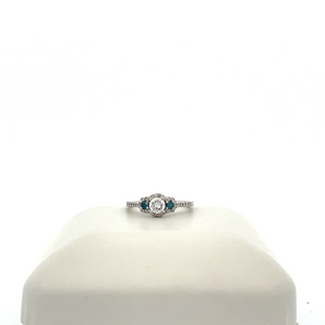 14k White Gold Engagement Ring with Blue Diamonds and Round Center