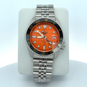 Silver SEIKO Watch with Orange Dial