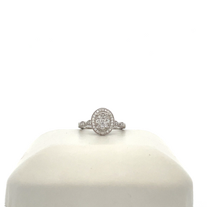 Lady's 14k White Gold Engagement Ring with Oval Cluster Center