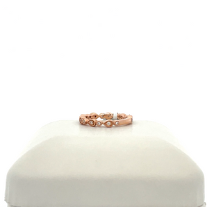 Lady's 14k Rose Gold Band with .18ctw Round Diamonds